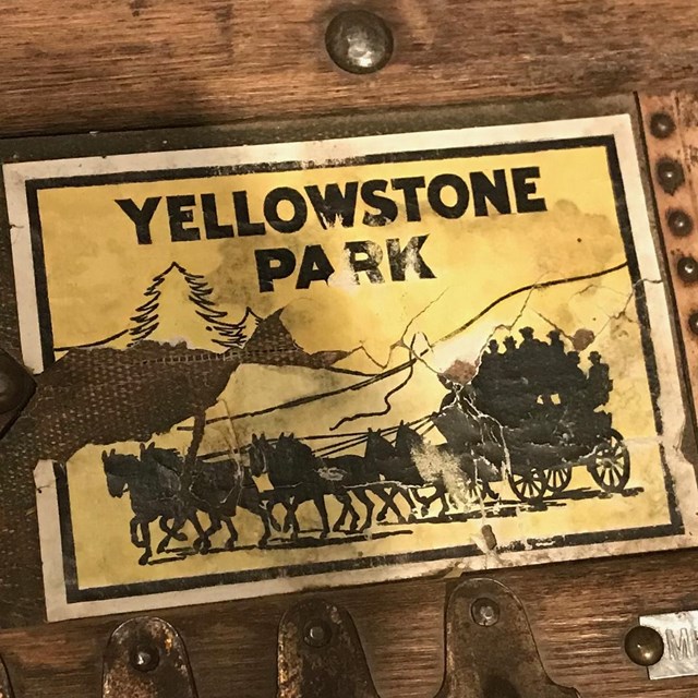 Old stickers on an old piece of luggage.